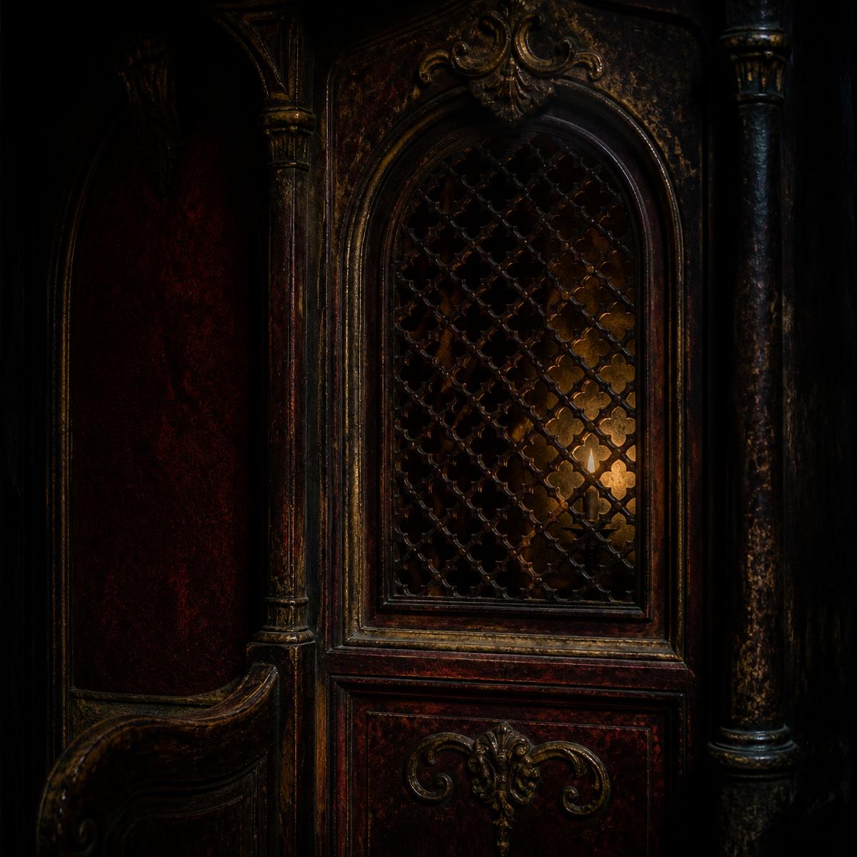 An ornate confessional screen lit by a single candle
